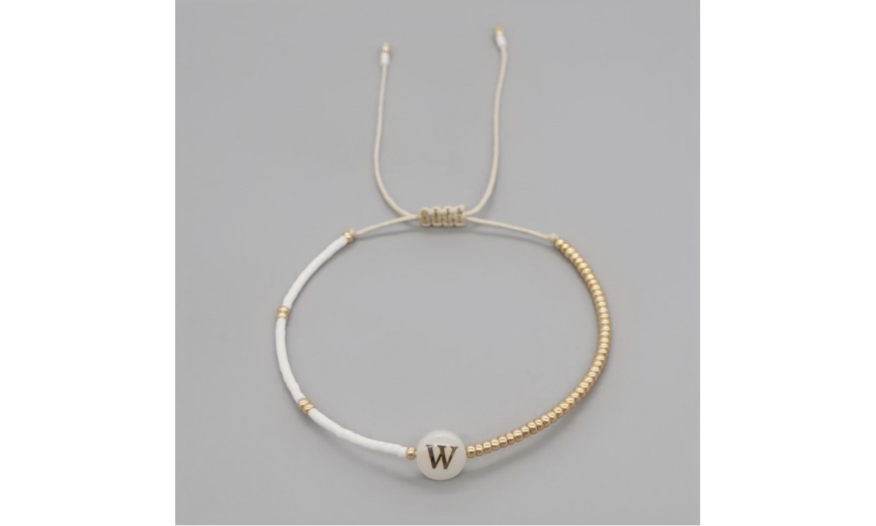 Pulseira Inicial Madrepérola Banho de Ouro 18k.