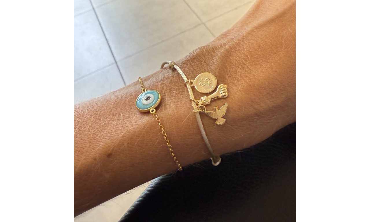 Pulseira Fio de Seda Patuá Banho de Ouro 18k.