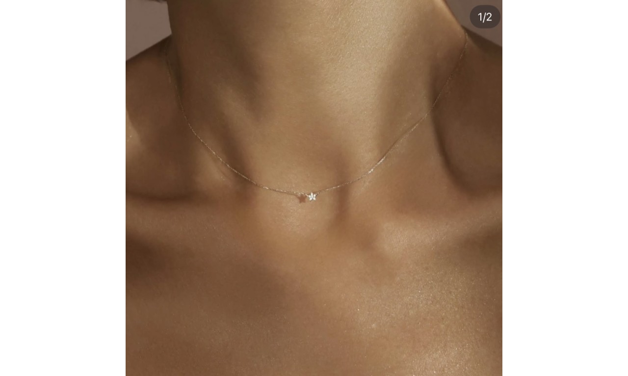 Colar Mini Estrela Cravejada Banho de Ouro 18k.